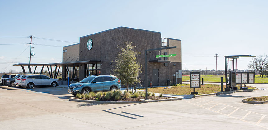 Exterior of a Starbucks building and drive thru